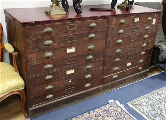 An early 20th century mahogany fourteen drawer plan chest